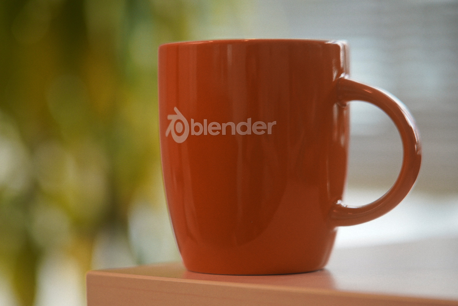 https://store.blender.org/wp-content/uploads/2018/11/blender_mug_orange_02.jpg